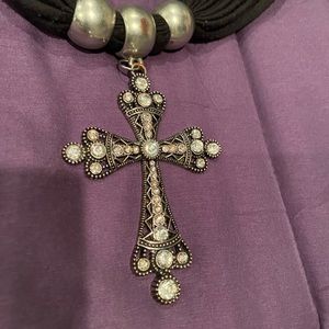 Two scarves with cross pendant, purple and black